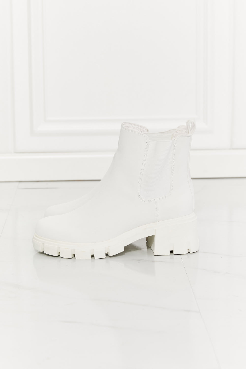 Artemis' Ascent: Empowering White Lug Sole Chelsea Boots