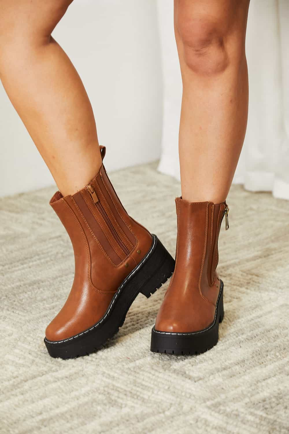 Athena's Groundbreakers: Empowering Platform Boots with Side Zip