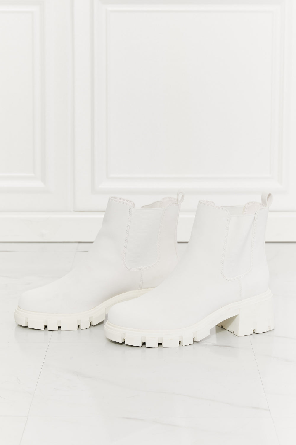 Artemis' Ascent: Empowering White Lug Sole Chelsea Boots