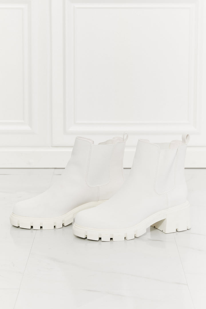 Artemis' Ascent: Empowering White Lug Sole Chelsea Boots