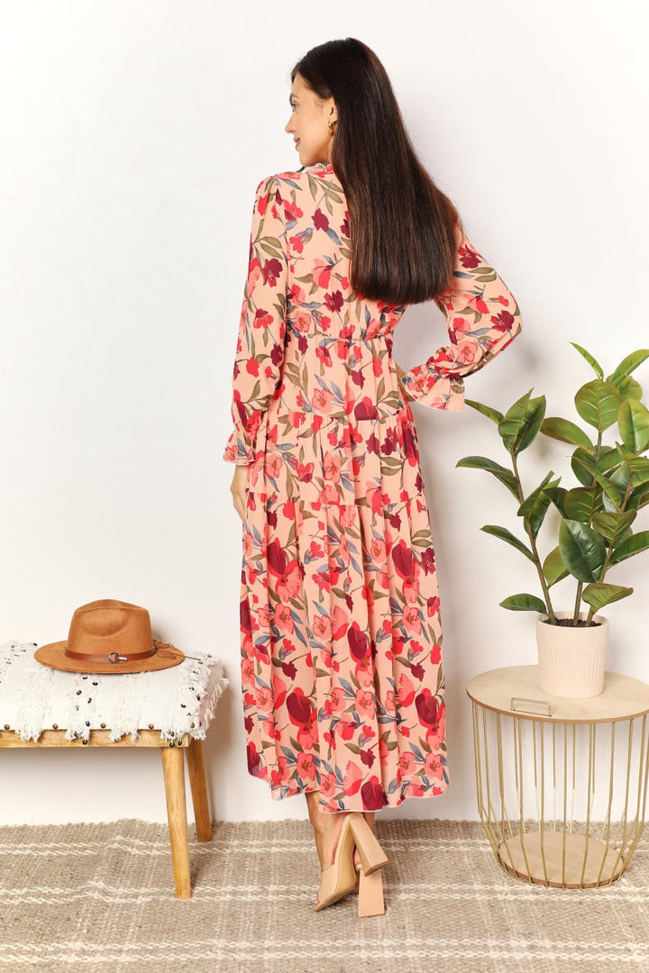 Mesmerize in Midnight: Floral Flounce Maxi Dress